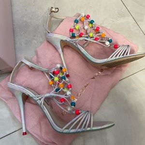 Sophia Webster sandals with woven beads on top of the foot.